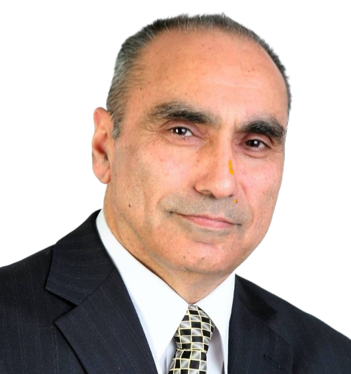 Sam Farmaha wears a dark suit and patterned tie against a white background, presenting a polished real estate portrait for the I Know GTA website.